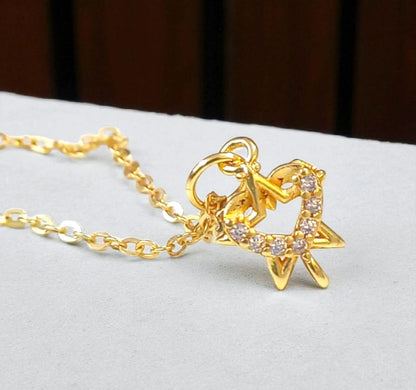 Gold Finish Star & Heart Crystal Charm Necklace